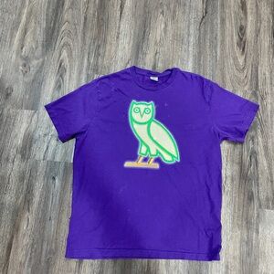 OVO Purple Tee with Green Owl Logo